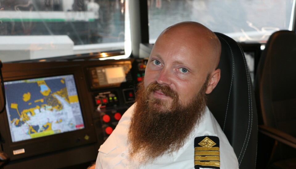 Captain of MS “Medstraum”, Einar Netland on the bridge of the award winning vessel
