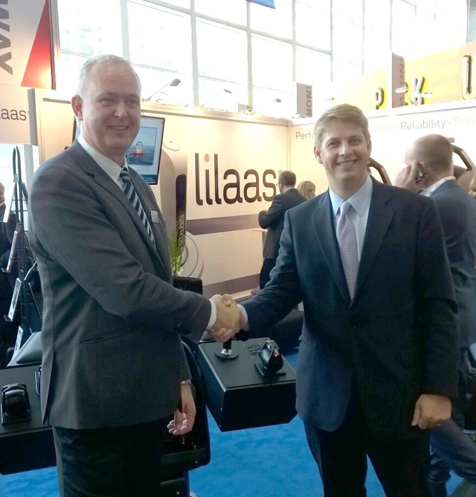 Lilaas Managing Director Øyvind Lilaas (left) and Alex Larsen, Imtra VP Commercial Sales, shake hands on the deal that is expected to open up the North American market to Lilaas controls.