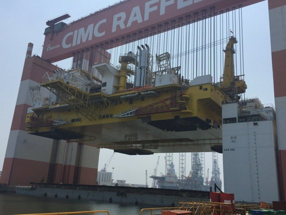Frigstad Deepwater Rig Alfa mating operation at Yantai CIMC Raffles Offshore.